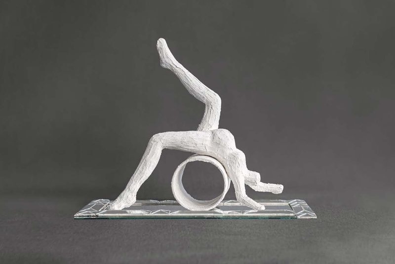 Cycle, 2024. Plaster figures on a mirrored base