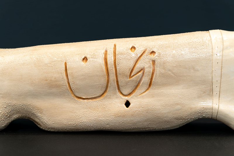 Knives (2026–27), hand-built ceramic knife with a blade of cut mirror pieces, view 3