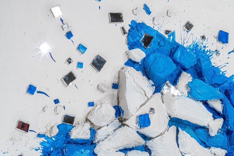 Memory Erosion (2025), broken plaster with ultramarine pigment and small mirror squares, view 2
