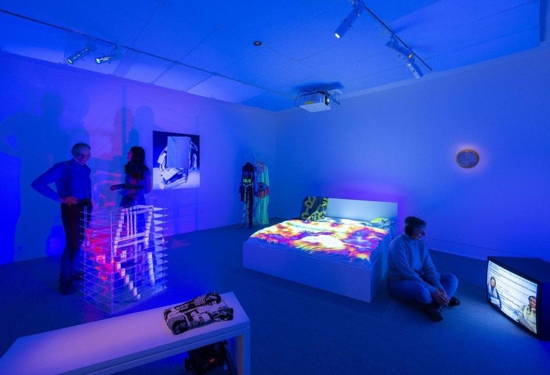 Sleep Synthesis (2023), video installation projected onto a bed in a darkened room, view 2