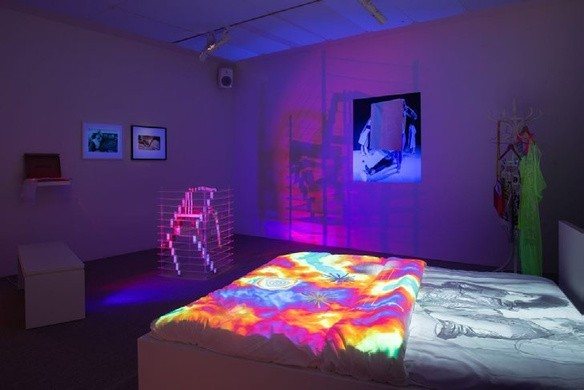 Sleep Synthesis (2023), video installation projected onto a bed in a darkened room, view 3