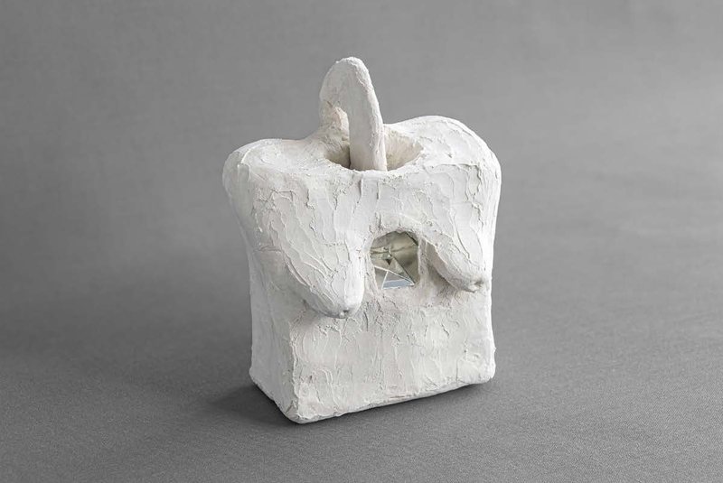 Surfing, 2024. Small plaster and mirror sculpture of a figure